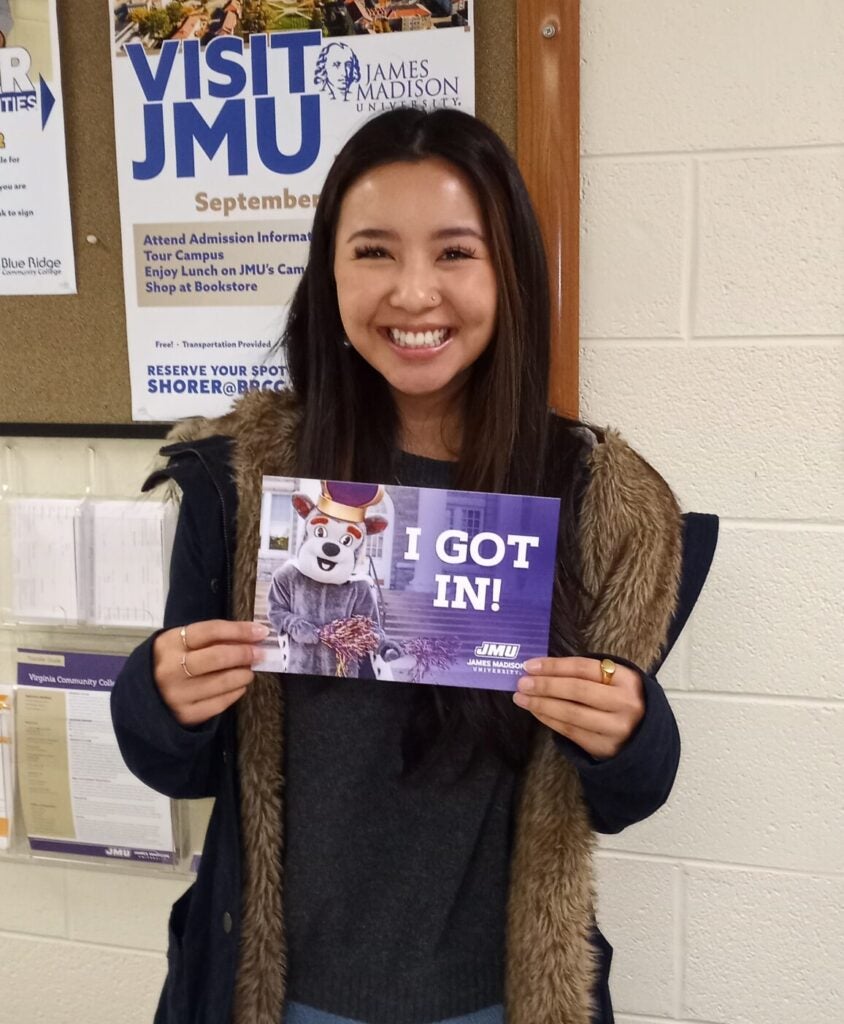 student with JMU acceptance paper