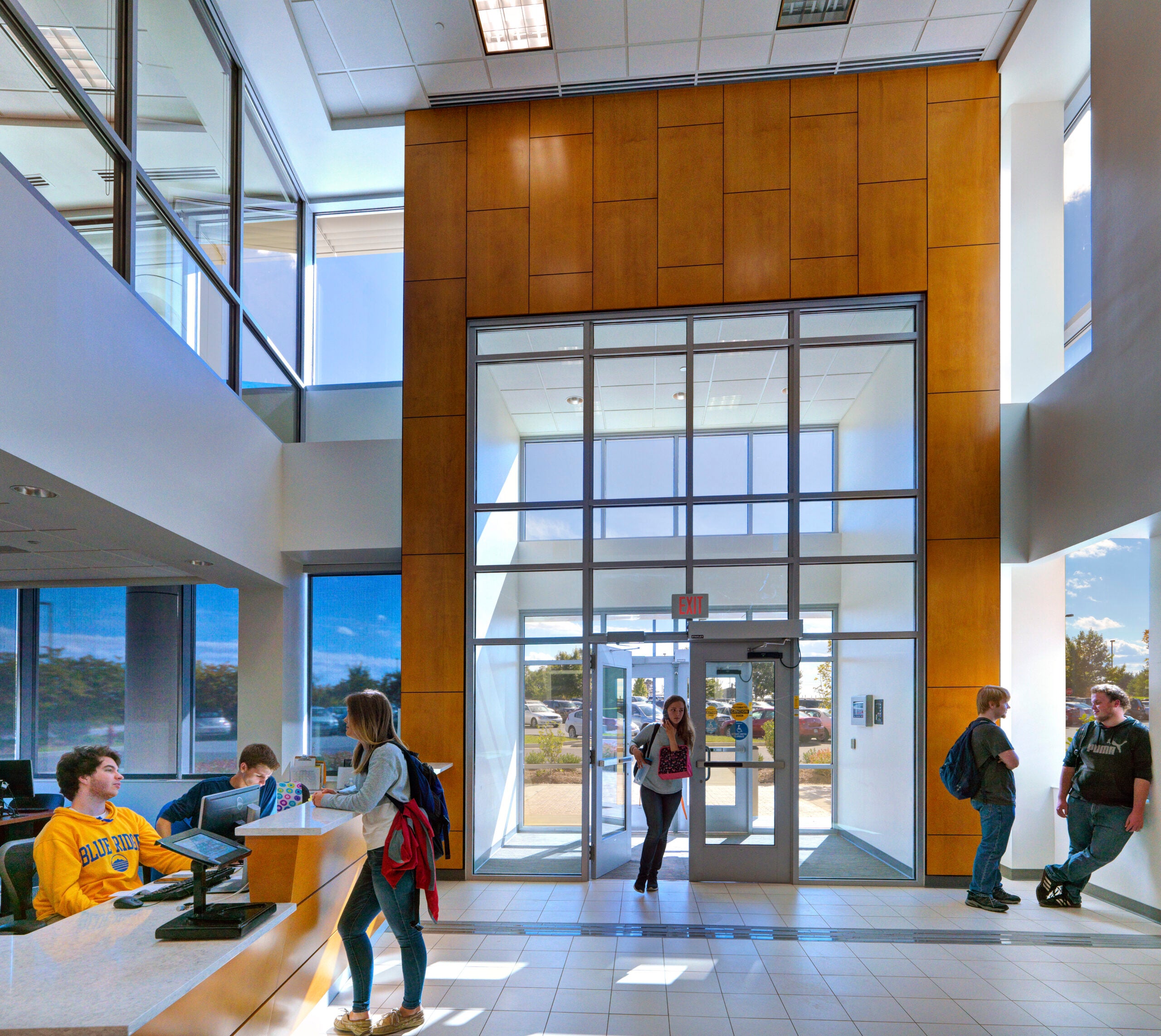 Houff Student Center lobby with people. Photo: Steve Maylone, courtesy Moseley Architects