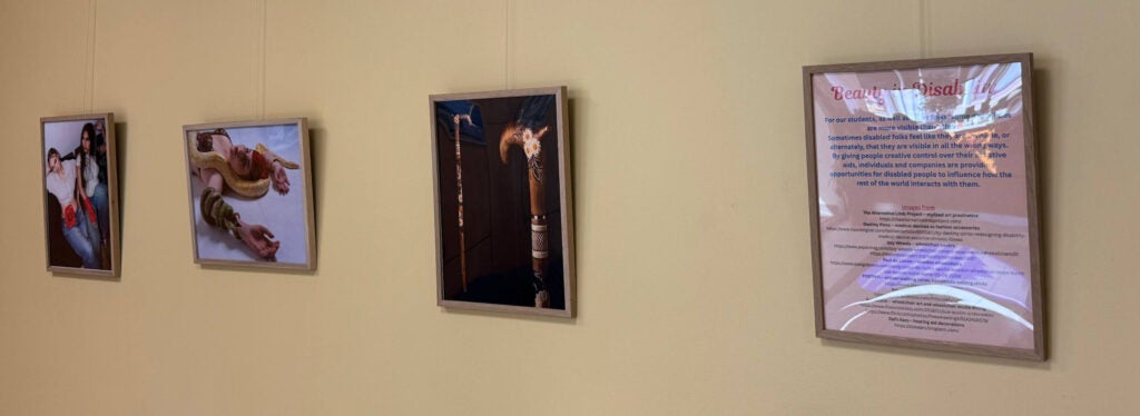 four framed images; the rightmost contains a description of the exhibition but it's not readable in the image. Others are photos of a cane, of a woman lying down, of two people sitting together