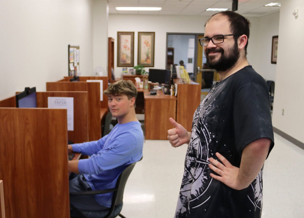 A student getting help in the Financial Aid office