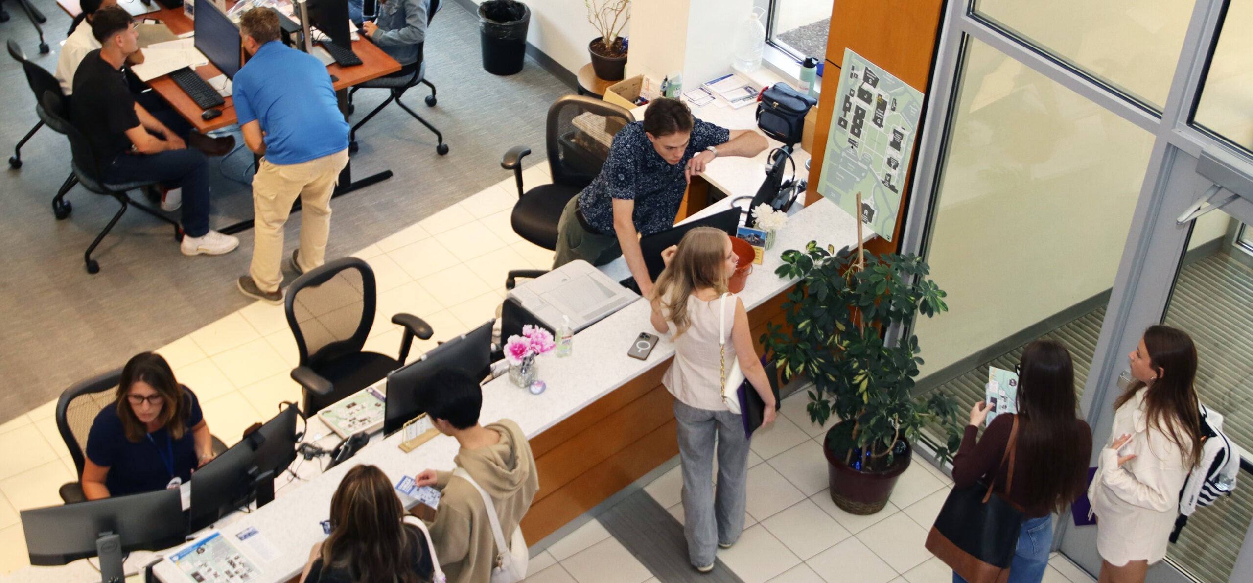 Students at the registration desk in Houff Student Center