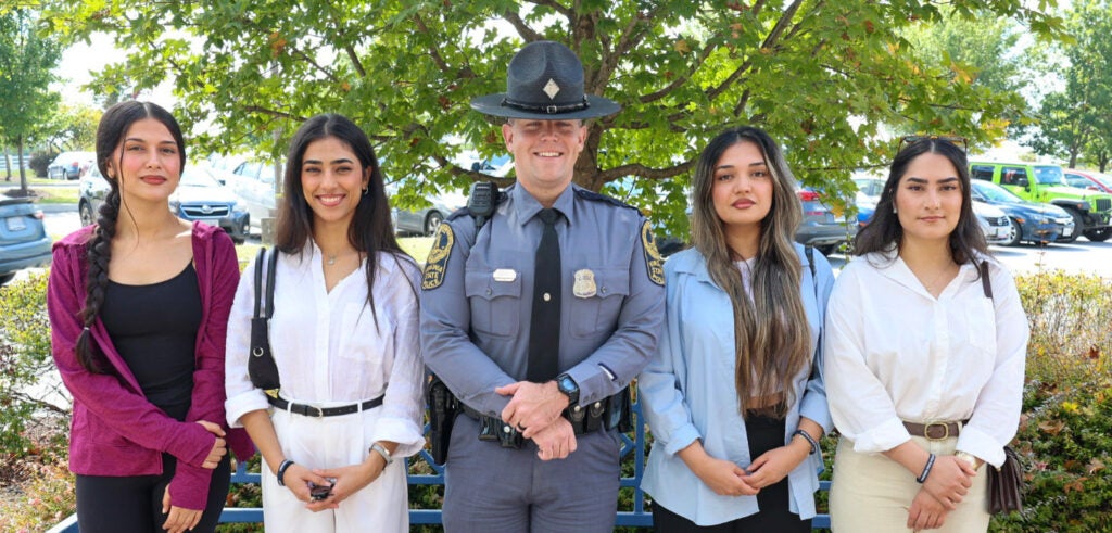 Leila Abdolaziz with sisters and instructor